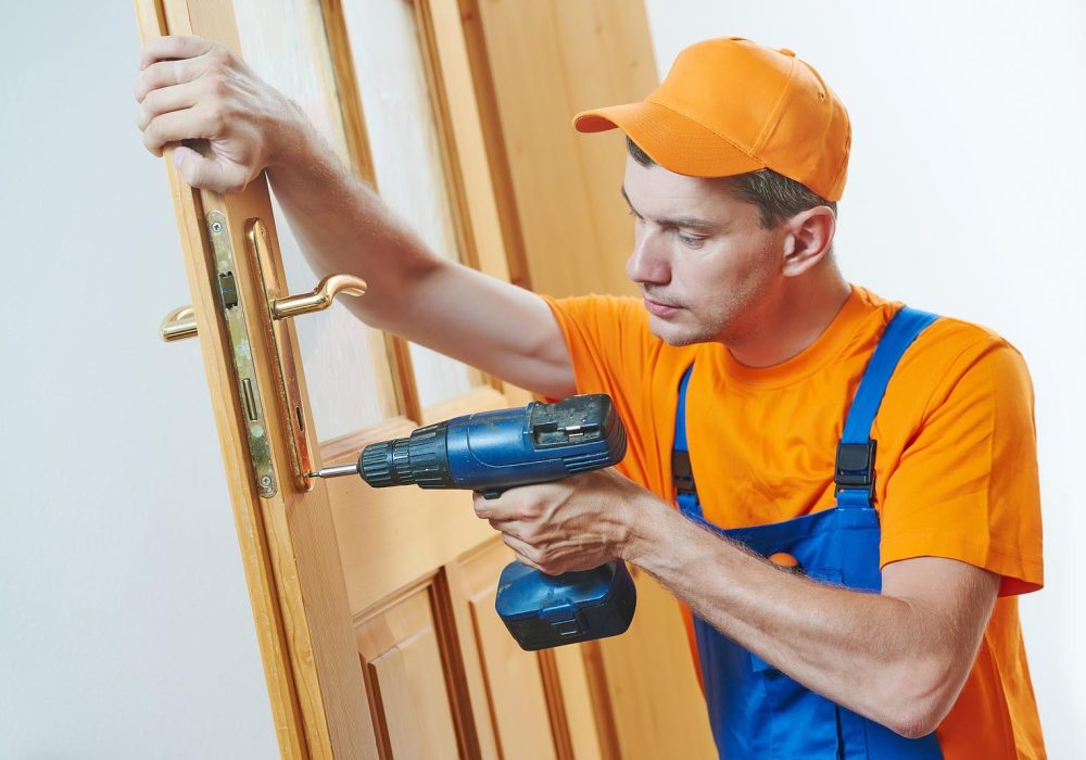 imgi_224_bigstock-carpenter-at-door-lock-install-199246723